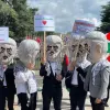 Israel Defense Forces reservists protest outside the U.N. Human Rights Council in Geneva, costumed as terrorists to “thank” the council for its anti-Israel bias in a demonstration organized by the Tel Aviv-based Shurat HaDin Law Center on June 7, 2022. Credit: Courtesy.