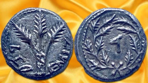 The two faces of the Year Four Quarter Shekel, minted in 69 C.E. during the Great Jewish Revolt against the Roman Empire. Credit: Israel Antiquities Authority.