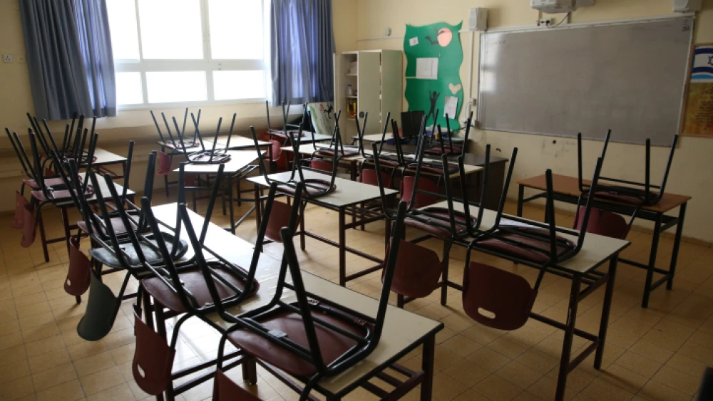 An empty classroom in the northern Israeli city of Tzfat, on March 13, 2020. Schools across the country have been shuttered as a preventive measure against the spread of the coronavirus. Photo by David Cohen/Flash90.