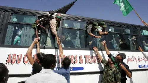 Palestinians who were freed from Israeli jails, as part of a prisoner-exchange deal to have for Israel Defense Forces kidnapped soldier Gilad Shalit returned home, arrive at the Rafah crossing border in the Gaza Strip, Oct. 18, 2011. Photo by Abed Rahim Khatib/Flash 90.