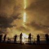 A slow shutter speed captures a streak of light from the engines on SpaceX's Polaris Dawn Falcon 9 rocket as it blasts off from Launch Complex 39A of NASA's Kennedy Space Center in Cape Canaveral, Florida, on Sept. 10, 2024. Photo by Joe Raedle/Getty Images.