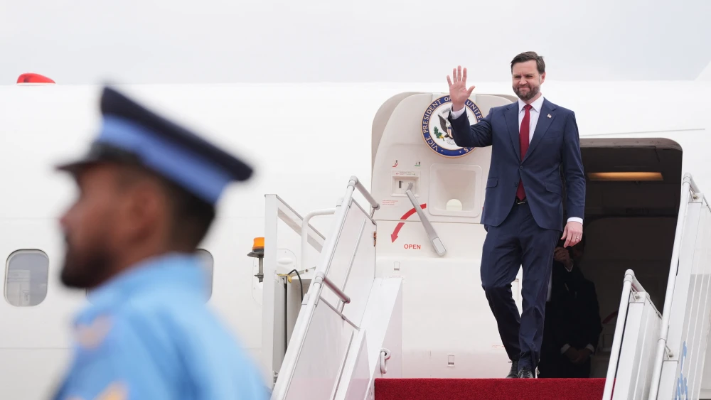 U.S. Vice President JD Vance disembarks from Air Force Two after arriving for talks with Iranian officials in Islamabad, April 11, 2026. Photo by Jacquelyn Martin/POOL/AFP via Getty Images.
