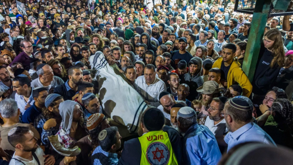 Friends and family attend the funeral of 21-year-old Israeli Harel Masood, who was killed in a terror attack near the near the Jewish settlement of Eli, in the cemetery in Yesodot, on June 20, 2023. Photo by Liron Moldovan/Flash90.