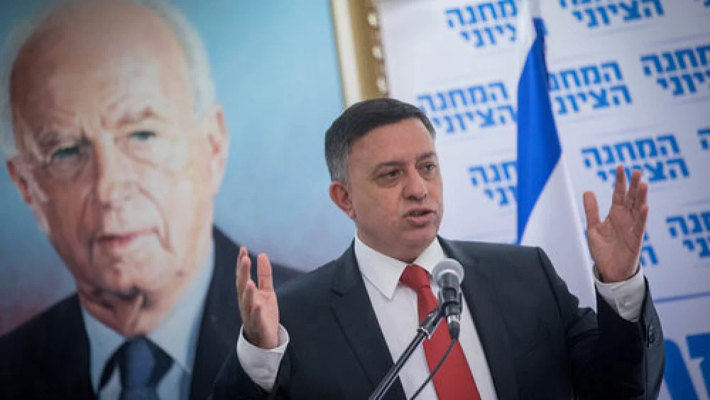 Avi Gabbay, head of the Zionist Union alliance and the Labor Party, leads a Zionist Union meeting at the Israeli Knesset on Nov. 20, 2017. In the background is a photo of former Israeli prime minister and Labor leader Yitzhak Rabin. Credit: Yonatan Sindel/Flash90.