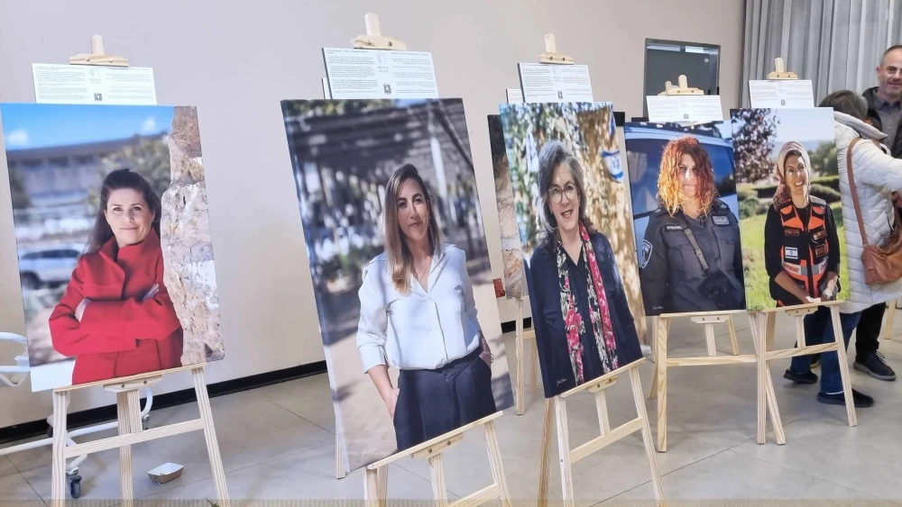 Photographs of Women of Iron, including Shari Mendes (center), at the Nefesh B'Nefesh Aliyah Campus in Jerusalem, Dec. 23, 2025. Photo by Sharon Altshul.