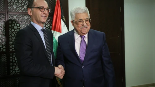 German Foreign Minister Heiko Maas shakes hands with Palestinian Authority leader Mahmoud Abbas during their meeting at the P.A.'s headquarters in Ramallah on March 26, 2018. Photo by Flash90.