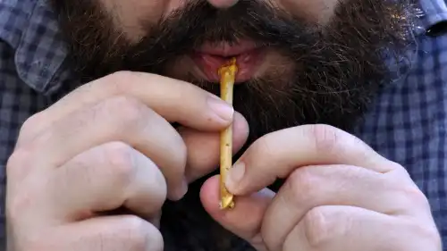 Using a replica of one of the ancient whistles. Photo by Laurent Davin.