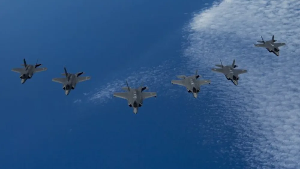 U.S. Air Force F-35A Lightning IIs (center) lead a formation of Royal Air Force F-35B Lightnings (left) and Israeli Air Force F-35I Lightning IIs (right) during Exercise Tri-Lightning over the Mediterranean Sea on June 25, 2019. Photo: Staff Sgt. Keifer Bowes/U.S. Air Force.