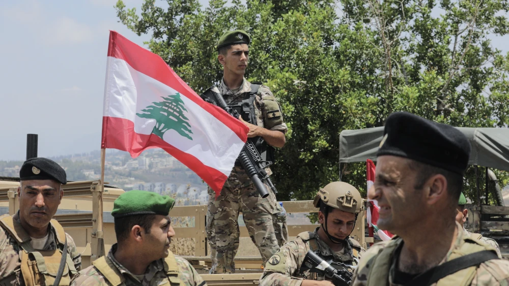 Lebanese soldiers patrol at the entrance to Zawtar al-Gharbiya after the army deployed to the southern village on July 22, 2026.