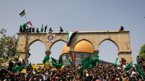 Muslims chant anti-Israel slogans near the Al-Aqsa mosque on the Temple Mount in Jerusalem on the last Friday of Ramadan, April 29, 2022. Photo by Jamal Awad/Flash90.