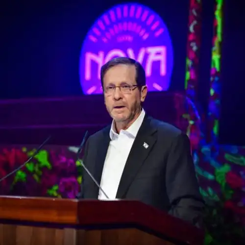 Israeli President Isaac Herzog attends the opening of an exhibition in Tel Aviv of objects collected from the site of the Supernova massacre, Dec. 7, 2023. Photo by Avshalom Sassoni/Flash90.