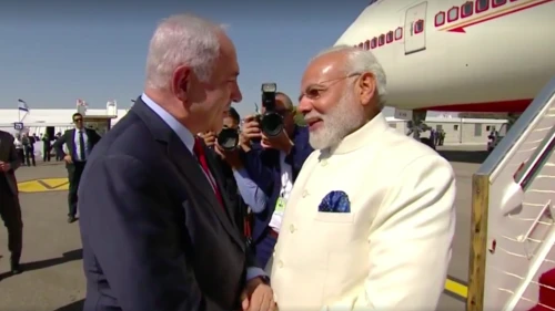 Prime Minister Benjamin Netanyahu (left) greets Indian Prime Minister Narendra Modi upon Modi's arrival in Israel Tuesday. Credit: Prime Minister Benjamin Netanyahu via Facebook.