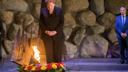 German Chancellor Angela Merkel lays a wreath during a ceremony at the Hall of Remembrance in the Yad Vashem Holocaust memorial in Jerusalem on Oct. 4, 2018. Photo by Oren Ben Hakoon/POOL.