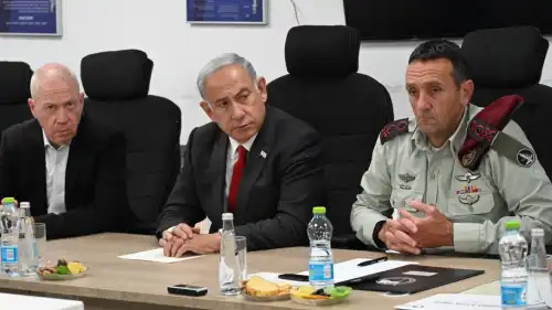 Israel's Prime Minister Benjamin Netanyahu holds a security assessment at Camp Dayan, north of Tel Aviv, after a barrage of rockets were fired from the Gaza Strip. Next to him are Israeli Defense Minister Yoav Gallant (left) and IDF Chief of Staff Herzi Halevy, May 2, 2023. Photo by Haim Zach/GPO.