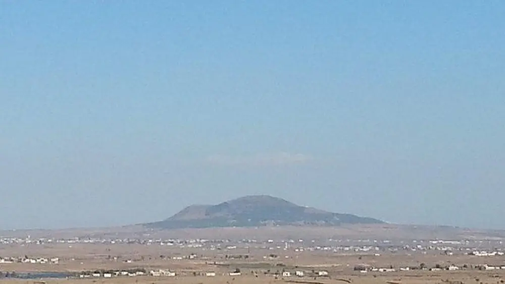 Tel al-Hara in the Hauran plain, seen from the Golan Heights, on Sept. 11, 2014. Credit: Mati Shaller via Wikimedia Commons.