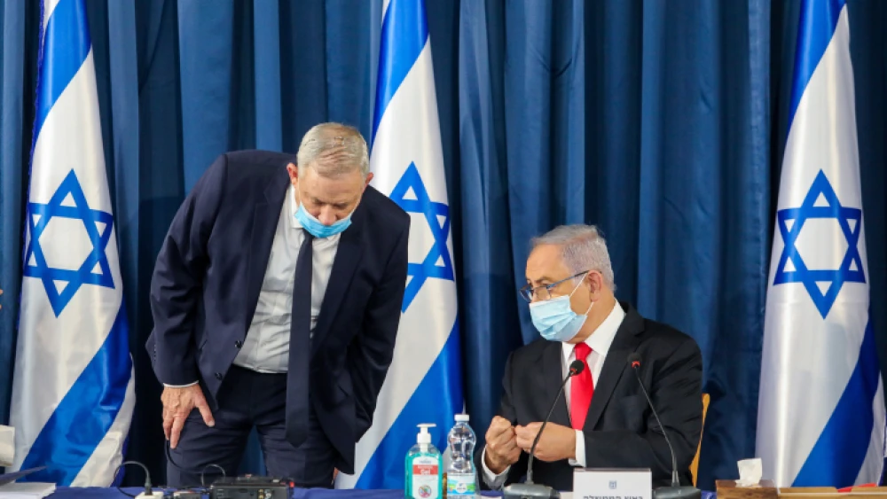 Israeli Prime Minister Benjamin Netanyahu (seated) and Vice Prime Minister Benny Gantz lead the weekly Cabinet meeting, in Jerusalem on June 7, 2020. Photo by Marc Israel Sellem/POOL.