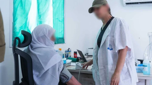 An Israeli medic treats a civilian at an Israel Defense Forces facility in southern Syria, May 2025. Credit: IDF.