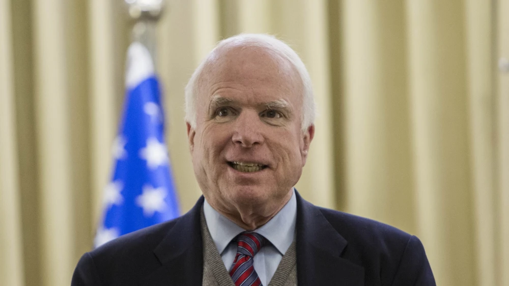 U.S. Sen. John McCain meets with Israeli President Shimon Peres (unseen) at the president’s residence in Jerusalem on Jan. 4, 2014. Photo by Yonatan Sindel/Flash90.