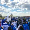Thousands of young people from around the world walk from Auschwitz to Birkenau, the sites of former Nazi death camps, as part of the 2017 “March of the Living” program in Poland. Credit: Drew Jacobson via Facebook.