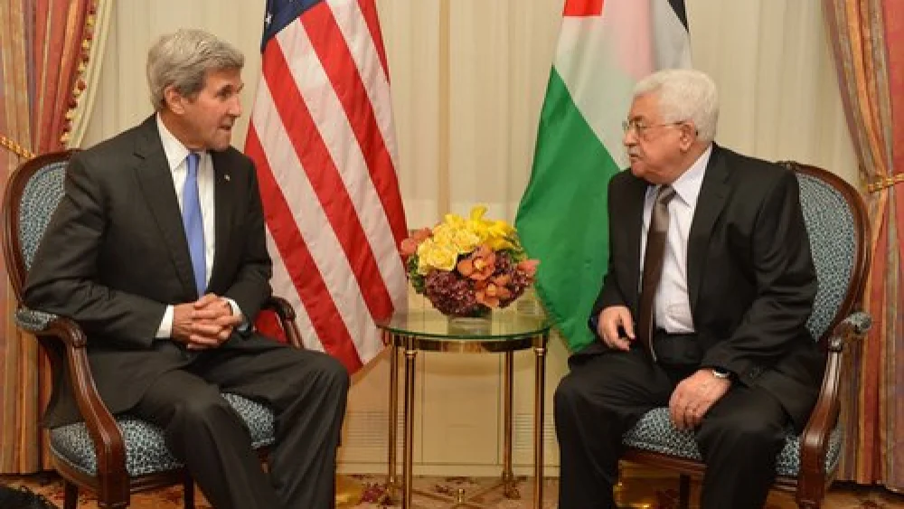 U.S. Secretary of State John Kerry with Palestinian Authority leader Mahmoud Abbas in New York on Sept. 19, 2016. Credit: U.S. State Department.