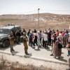 Israeli soldiers detain Israeli left-wing activists during a tour led by NGO Breaking the Silence in Mitzpe Yair, near Hebron, on Aug. 31, 2018. Photo by Wisam Hashlamoun/Flash90.