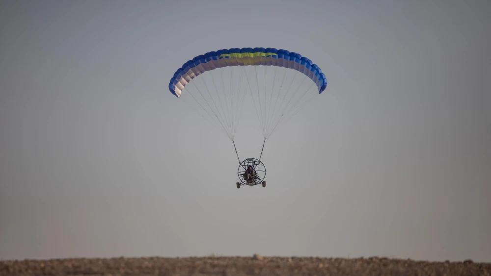A paraglider flies near the Dead Sea in Israel, Aug. 2, 2019. Photo by Aharon Krohn/Flash90.