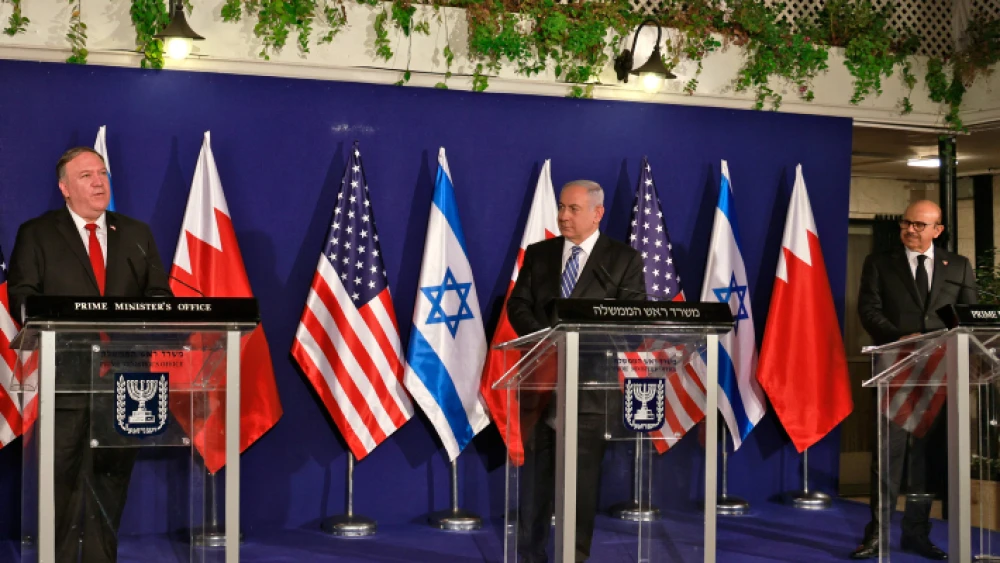 U.S. Secretary of State Mike Pompeo alongside Israeli Prime Minister Benjamin Netanyahu and Bahrain's Foreign Minister Abdullatif bin Rashid Al-Zayani at a press conference after their trilateral meeting in Jerusalem on Nov. 18, 2020. Photo by Menahem Kahana/POOL.