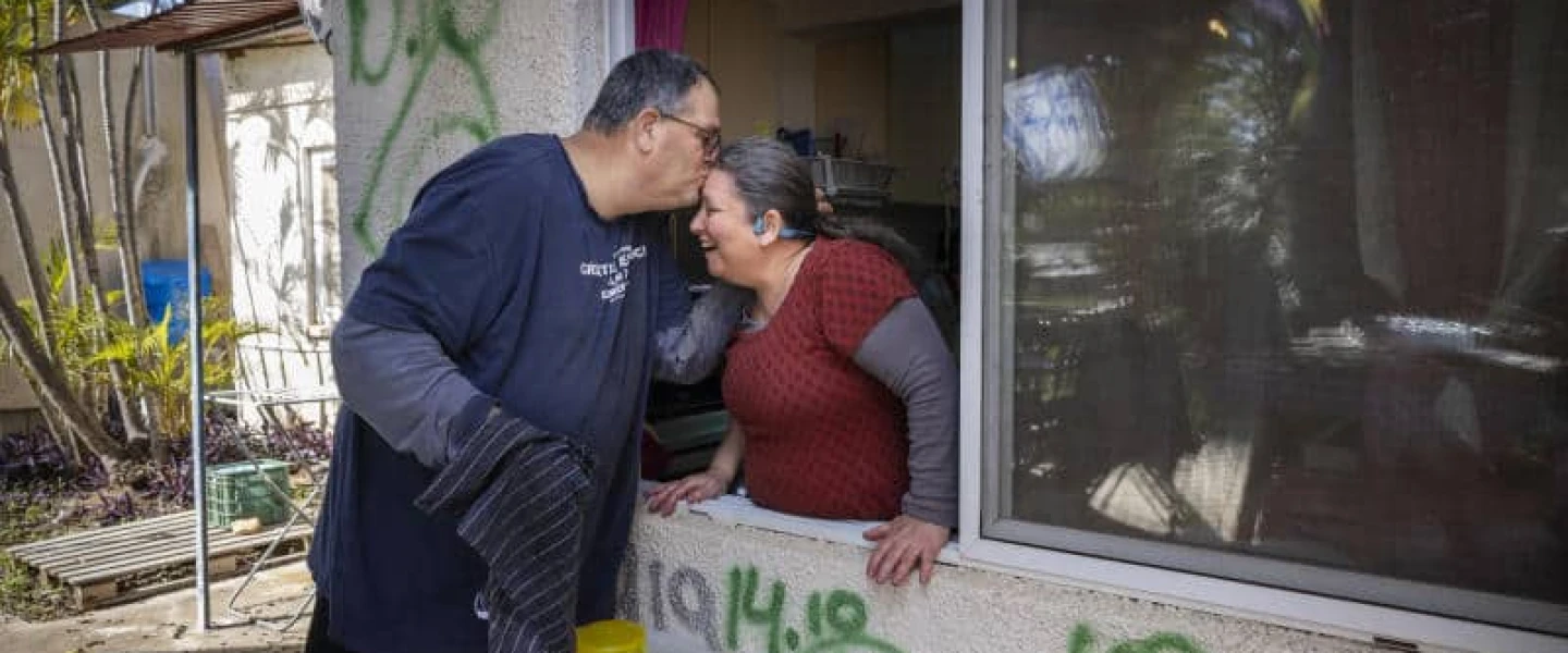 Shahar Snurman and his wife, Ayelet Kohn, in Kibbutz Kfar Aza, one of the communities hardest hit during Hamas's Oct. 7 massacre. Credit: Courtesy of Shahar Snurman.