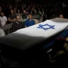 Israeli soldiers carry the coffin of fellow soldier Ronen Lubarsky, who was critically injured during an operation in the West Bank and later died from his wounds, during his funeral at the Mount Herzl Military Cemetery in Jerusalem on May 27, 2018. Photo by Yonatan Sindel/Flash90.