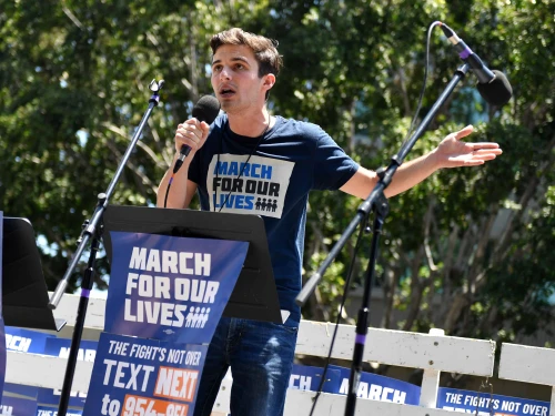 Cameron Kasky, co-founder of the student-led, gun-violence prevention group “Never Again,” speaks at the “March for Our Lives II” rally in Los Angeles against gun violence, June 11, 2022. The March for Our Lives movement was spurred by the mass shooting at Marjory Stoneman Douglas High School in Parkland, Fla., on Feb. 14, 2018. Photo by Sarah Morris/Getty Images.