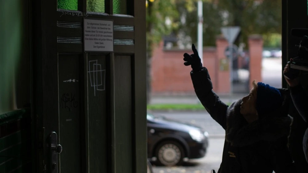 Eve recounted that “when I was 7, SS officers burst into our home. They tore the pages out of my grandfather’s gemara, ripped his tallit and shredded his Sefer Torah. Credit: Courtesy.