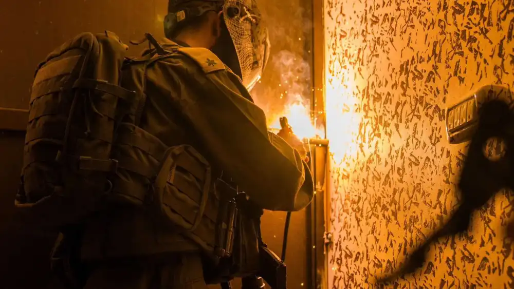 An IDF soldier seals the home of a Palestinian terrorist in a village near Ramallah in Samaria, September 2025. Credit: IDF.