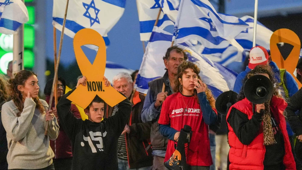 Israelis protest for the release of Israelis held hostage in the Gaza Strip at the Goma junction, northern Israel, Nov. 30, 2024. Photo by Ayal Margolin/Flash90.