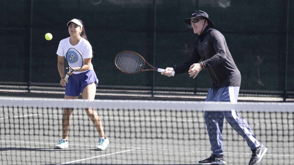 Inbar Poni from Ramat Hasharon, Israel, plays alongside legendary tennis coach Brad Gilbert at St. Andrews Country Club in Boca Raton, Fla. Credit: Courtesy of the Israel Tennis and Education Centers.