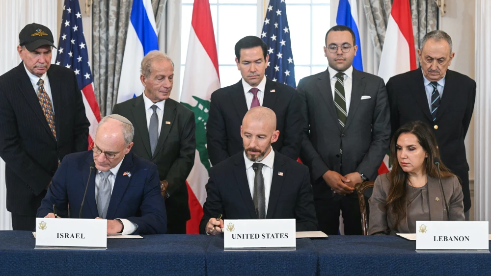 U.S. Secretary of State Marco Rubio (C, back) looks on as (L/R, front row) Israeli Ambassador to the U.S. Yechiel Leiter, State Department Chief of Staff Daniel Holler and Lebanese Ambassador to the U.S. Nada Hamadeh sign a framework agreement at the U.S. Department of State in Washington, D.C., on June 26, 2026. Lebanon. Photo by Saul Loeb/AFP via Getty Images.