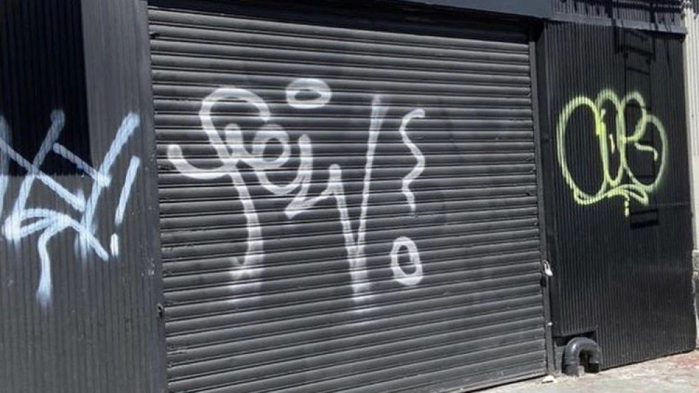 Anti-Semitic graffiti found outside the House of Lancry fashion store in the Crown Heights neighborhood of Brooklyn, N.Y. Credit: Courtesy.