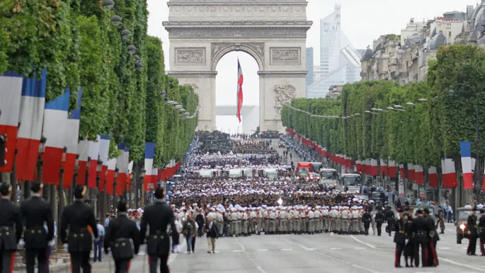 A military parade on the Champs-Élysées in Paris on Bastille Day, July 14, 2014. Photo: Pierre-Yves Beaudouin via Wikimedia Commons.