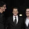 U.S. directors and producers Joel (left) and Ethan Coen pose for photographs with US actor and cast member Michael Stuhlbarg on the red carpet as they arrive at the screening of their film, "A Serious Man" during the 4th annual Rome Film Festival in Italy on Oct. 22, 2009. Credit: EPA/Guida Montani.
