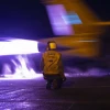 A U.S. Navy sailor conducts flight operations aboard the aircraft carrier USS George H.W. Bush, July 29, 2026. The ship is deployed to the U.S. 5th Fleet area of operations to support maritime security and stability in the Middle East. Photo via U.S. Central Command.
