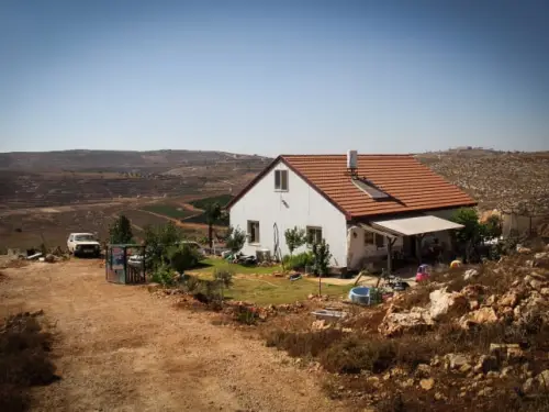 A house in the Israeli outpost of Esh Kodesh near Shiloh in the Binyamin Region, July 20, 2015. Photo by Garrett Mills/Flash90.