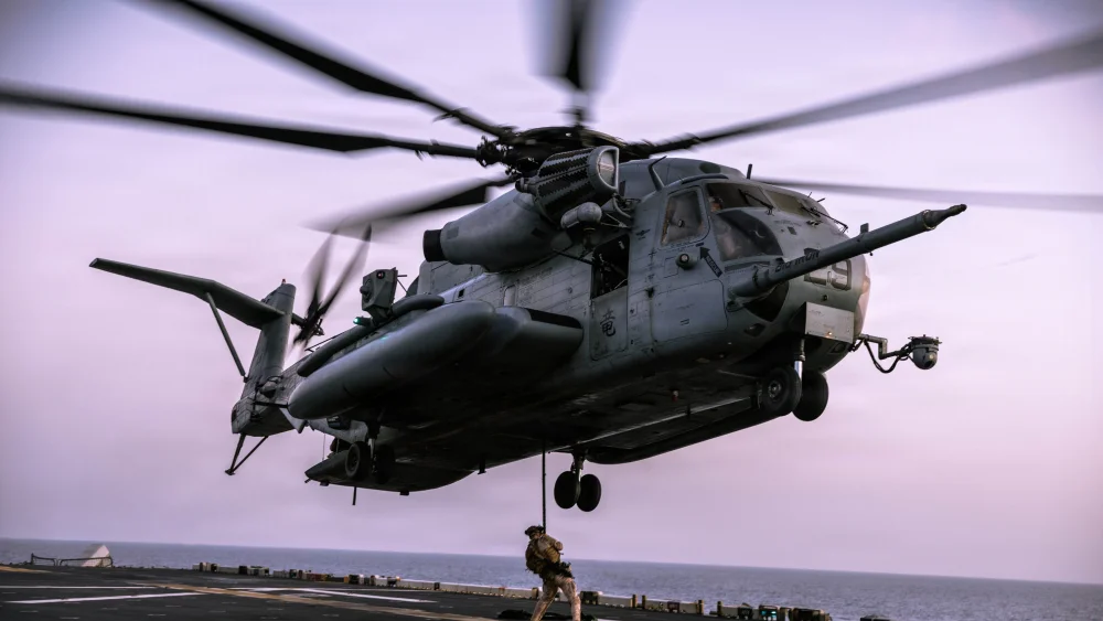 U.S. Marines with the Maritime Raid Force, 31st Marine Expeditionary Unit, conduct fast-rope training aboard the USS Tripoli in the Arabian Sea, in this image released by U.S. Central Command on June 2, 2026. Source: @CENTCOM/X.