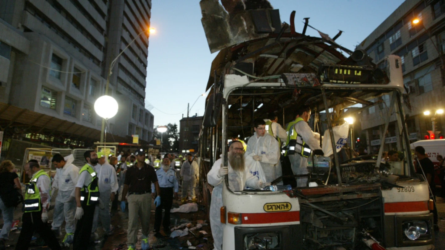 Paramedics and police at the scene of the suicide bombing on a bus in Jerusalem on June 11, 2003. Photo by Flash90.
