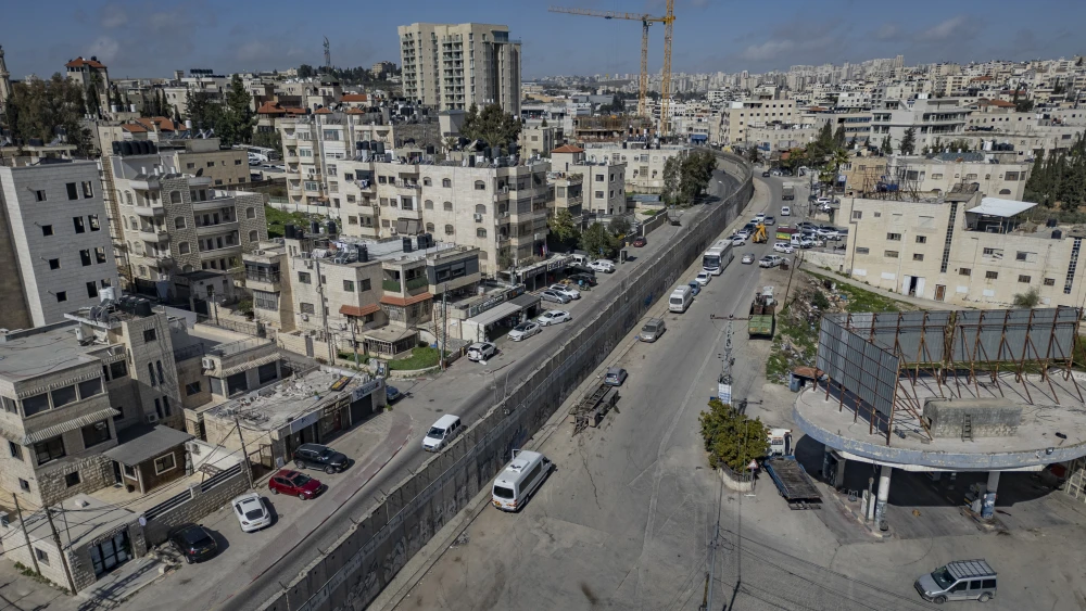 A view of the security barrier in the eastern Jerusalem neighborhood of Beit Hanina, after Israeli security forces placed concrete barriers to block a road as part of an operation targeting Palestinians residing in Israel illegally, Feb. 10, 2026. Photo by Chaim Goldberg/Flash90.