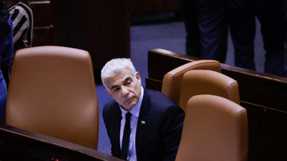 Israeli Foreign Minister Yair Lapid in the Knesset, on June 21, 2021. Photo by Olivier Fitoussi/Flash90.