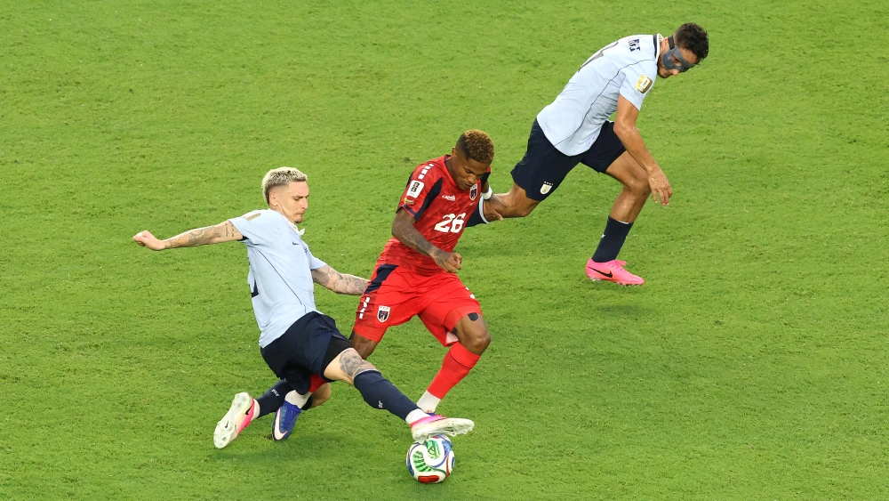 Helio Varela #26 of Cabo Verde is challenged by Guillermo Varela #13 of Uruguay during the FIFA World Cup 2026 Group H match between Uruguay and Cabo Verde at Miami Stadium on June 21, 2026 in Miami Gardens, Florida. Photo by Molly Darlington/Getty Images.