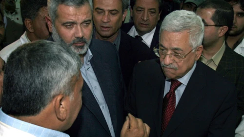 Hamas Prime Minister Ismail Haniyeh (left) and Palestinian Authority leader Mahmoud Abbas visit Odwan Hospital in the northern Gaza Strip, Nov. 8, 2006. Photo by Ahmad Khateib/Flash90.