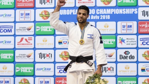 Israel's Sagi Muki earns the gold medal on the podium after winning in the men's “under 81 kilogram” weight category during the European Judo Championship in Tel Aviv on April 27, 2018. Photo by Roy Alima/Flash90.