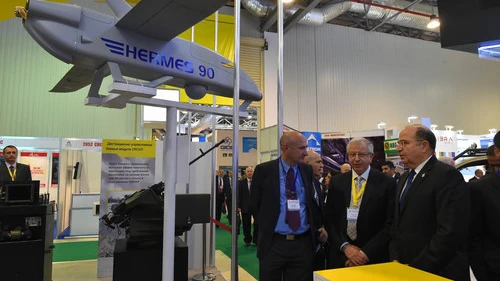 Click photo to download. Caption: Israeli Defense Minister Moshe Ya'alon (pictured at right) unveiled the Israeli stall at the Adex 2014 International Defense Industry Exhibition in Azerbaijan on Sept. 11, 2014. Ya'alon's trip marked the first official state visit to Azerbaijan by an Israeli defense minister. Credit: Ariel Hermoni/Ministry of Defense/Flash90.