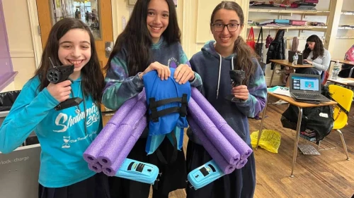 Students from Shulamith School in Cedarhurst, N.Y., use grant money secured by Teach NYS for engineering competitions to create innovations such as a flotation device for children that is operated via remote control by a parent. Credit: Courtesy.