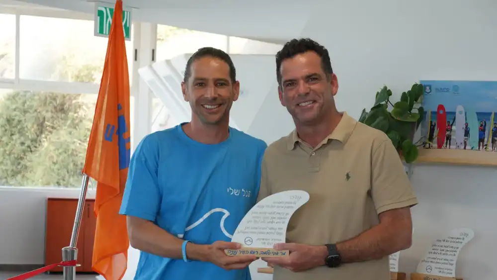 HaGal Sheli co-founder and CEO Yaron Waksman (left) and Netanya Mayor Avi Slama at the official opening of the HaGal Sheli Netanya Surf Therapy Center. Credit: Courtesy of HaGal Sheli.